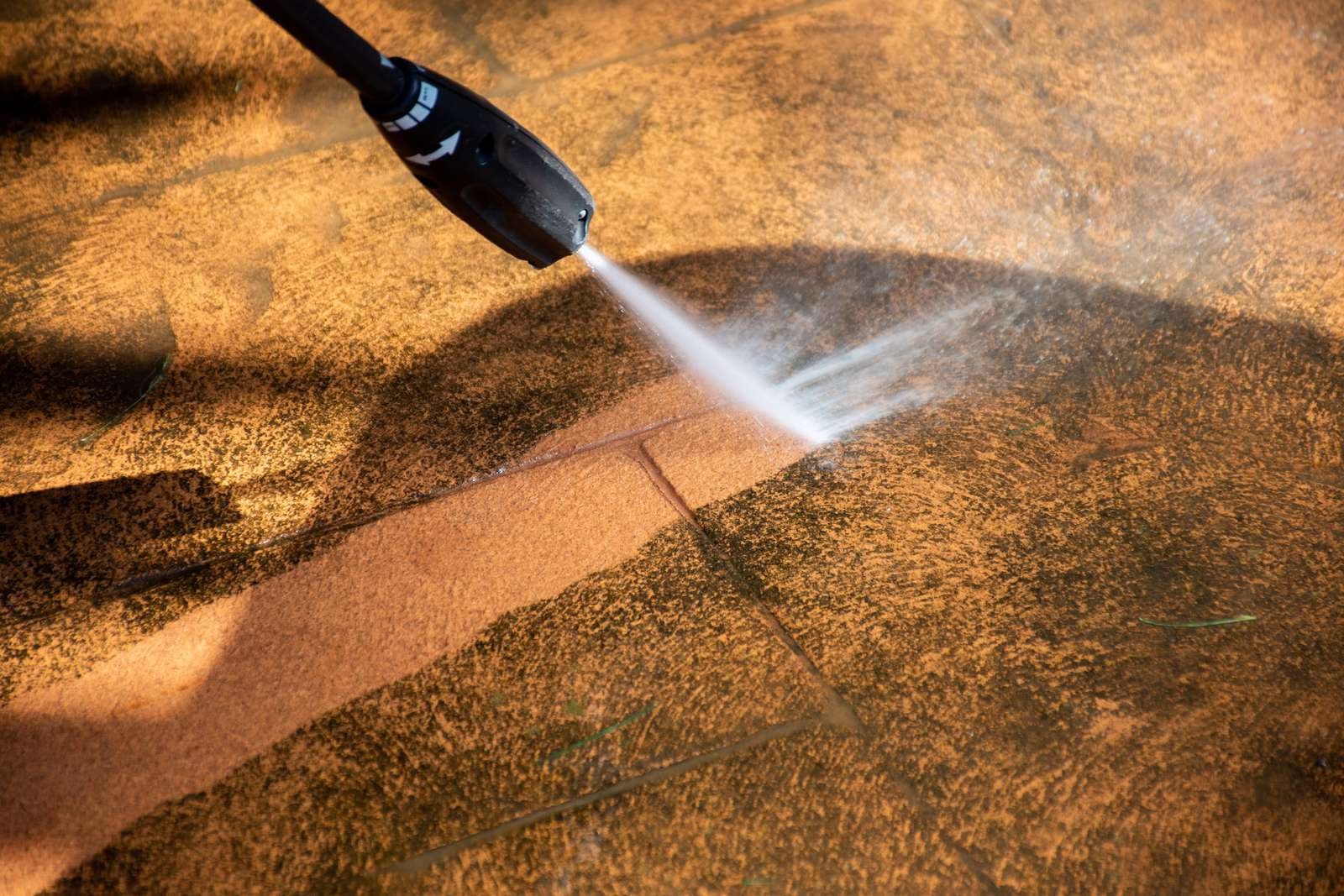Patio surface being washed at close range